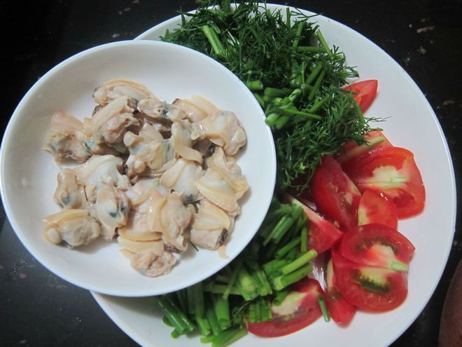 ngao sau khi luộc tách vỏ lấy thịt