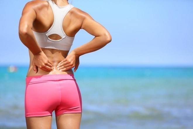 đau lưng cản trở quá trình tập luyện thể dục