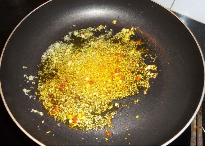 xào nghệ với mỡ gà