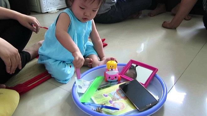 nghi lễ chọn nghề cho bé trong ngày cúng thôi nôi