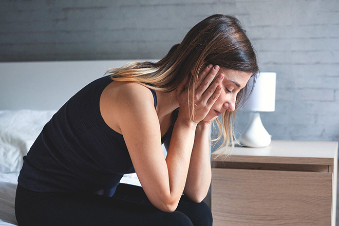 Phụ nữ mệt mỏi khó chịu