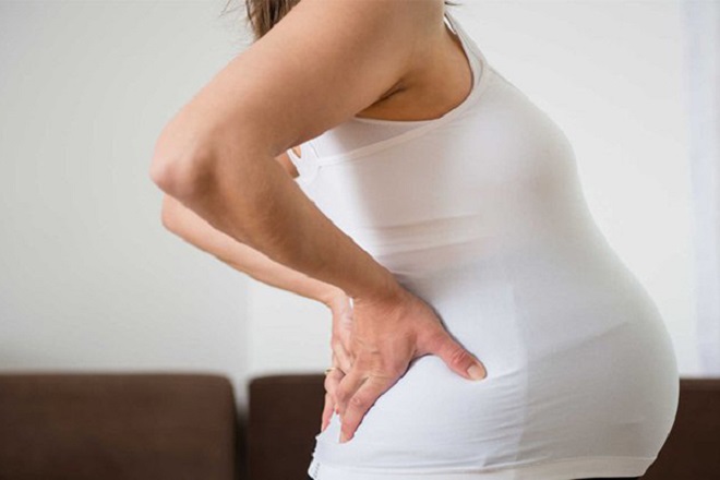 Đau lưng là dấu hiệu sắp sinh