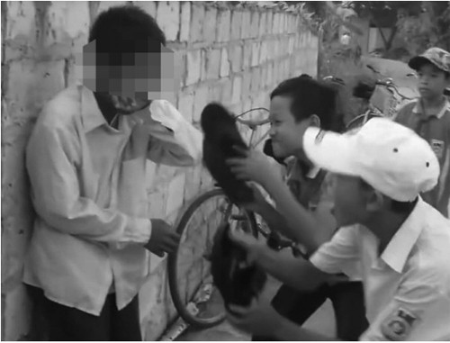 bang hoang tro cap 2 bi danh hoi dong ep nop tien an sang o hai duong 1.jpg