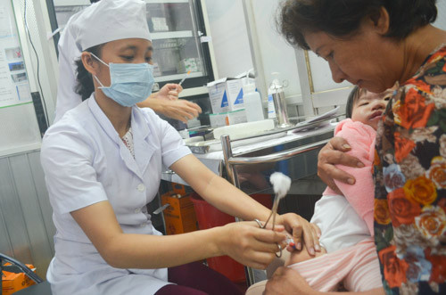 1481540077 vac xin.jpg